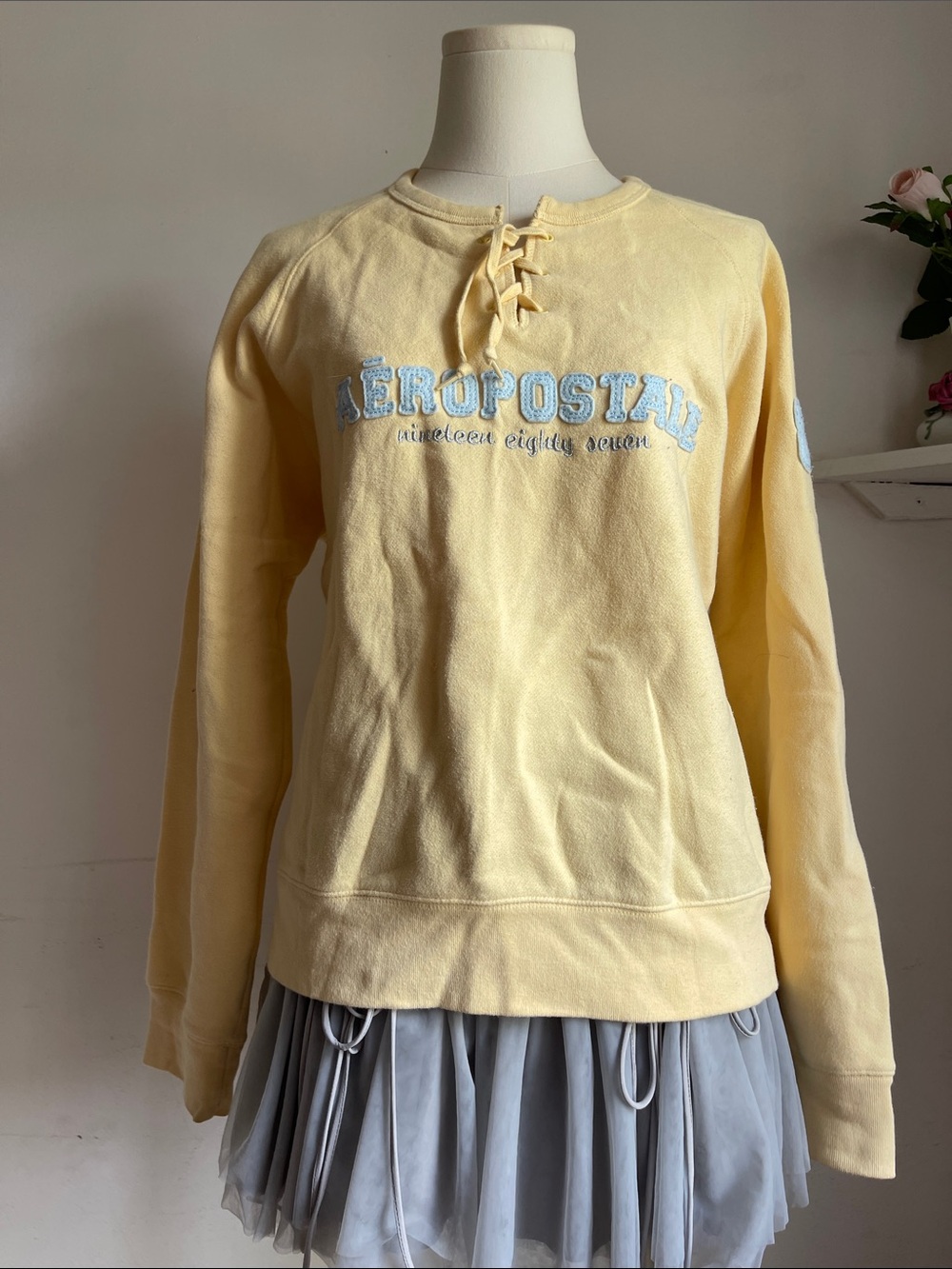 Aeropostale Lace-Up Crewneck Sweatshirt in Pale Yellow with Light Blue Logo